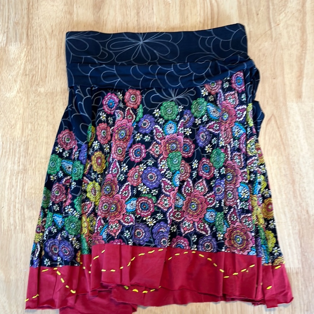 Super fun short circle skirt with tie at side.